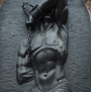 statue figure in chains